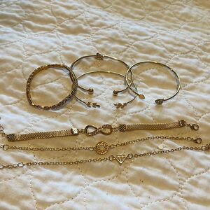 7 Gold tone Bracelets for One Price